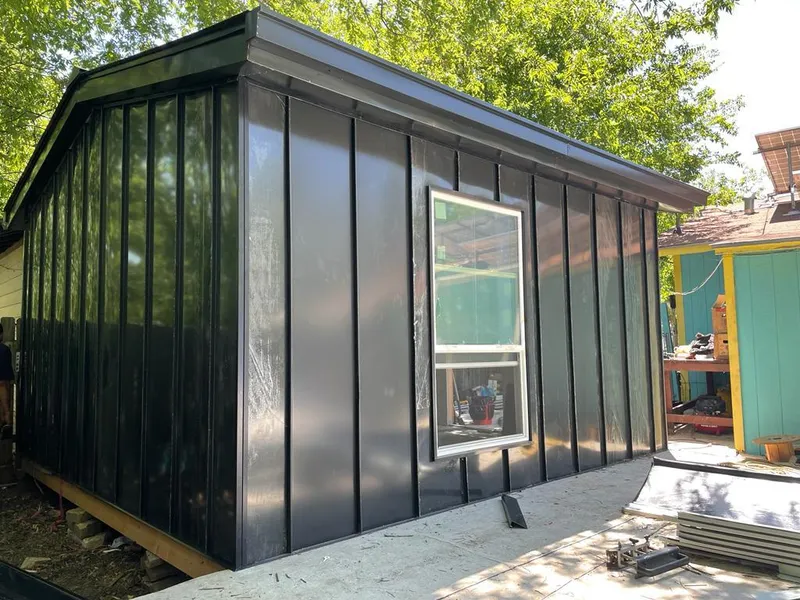 Black standing seam metal wall panels for Metal Roof Installation in King