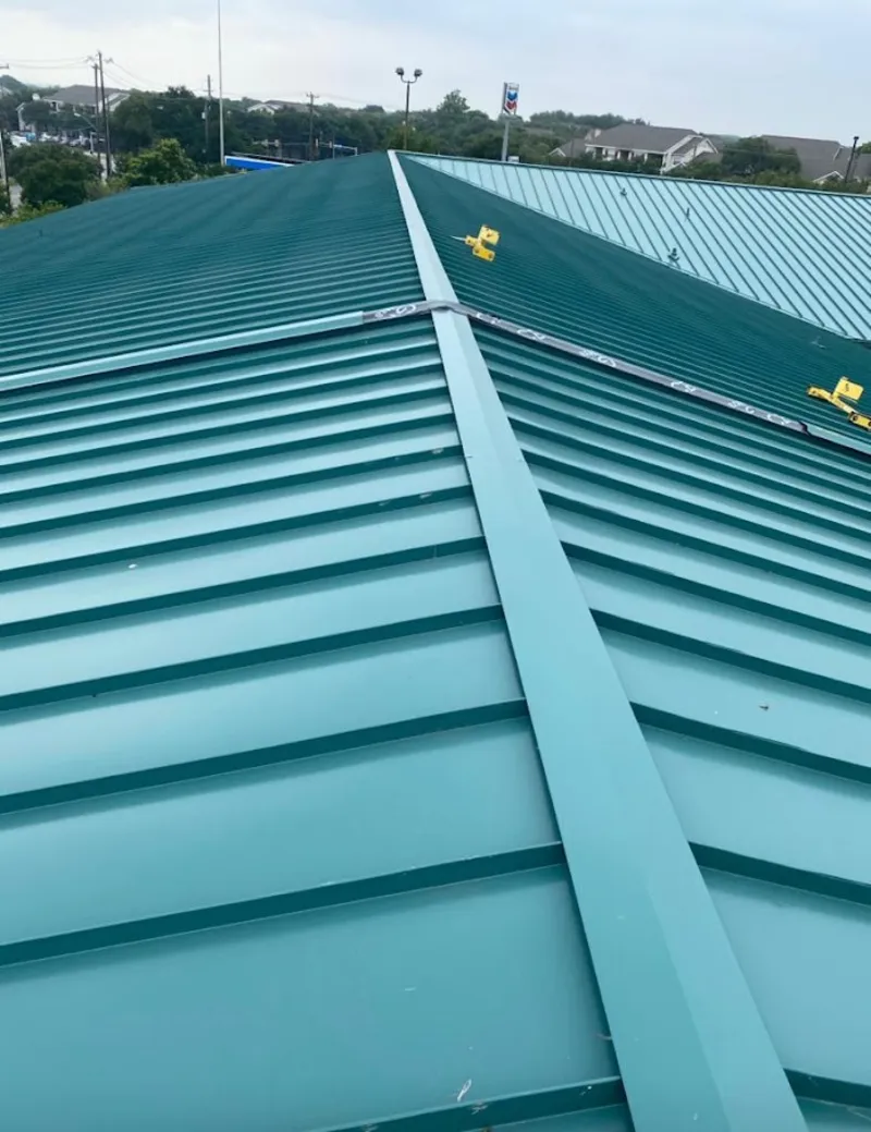 Green commercial metal roof ridge and valley for Metal Roof Repair in King