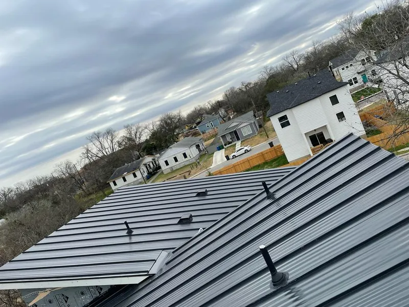 Standing seam metal roof panels with vents for Skylight Repair in King